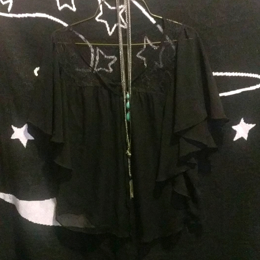 Sheer laying blouse with necklaces